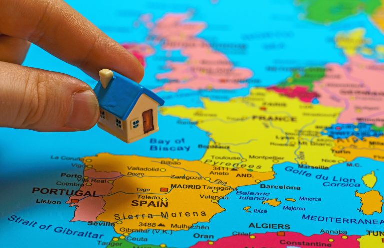 Small,Toy,House,On,The,Map,Of,Spain.