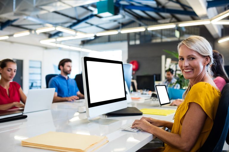 Casual,Business,People,Working,On,Computer,In,The,Office