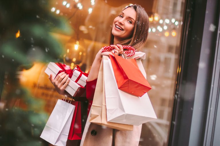 Beautiful,Happy,Girl,Hold,Shopping,Bags,And,Gift,Boxes,In
