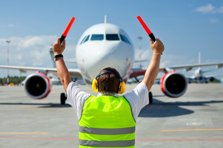 Ground,Crew,In,The,Signal,Vest.,Aviation,Marshall,/,Supervisor