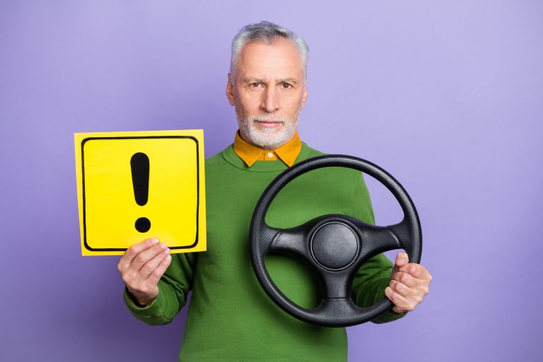 Photo,Of,Confident,Man,Pensioner,Dressed,Green,Pullover,Holding,Steering