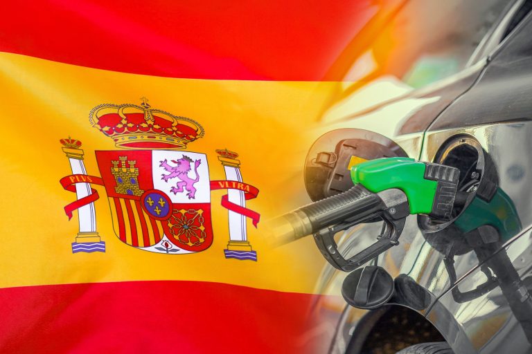 Car,With,A,Fuel,Injector,On,Spain,Flag,Background.,Record