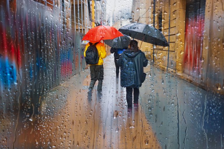 People,With,An,Umbrella,In,Raining,Days,,Bilbao,,Basque,Country,