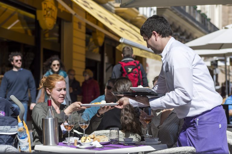 Valencia,,Spain,-,February,20,,2017,:,Waiter,Serving,A