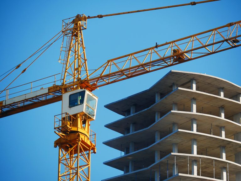 Crane.,Self-erection,Crane,Over,Construction,Site.,Crane,Near,Bulding.,Industrial