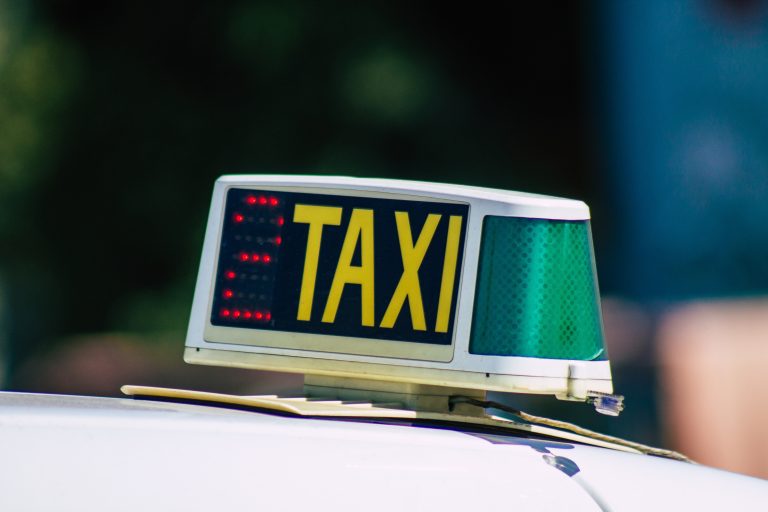 Seville,Spain,September,04,,2021,Taxi,Driving,Through,The,Streets