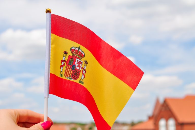 Close,Up,Of,National,Spanish,Flag,Yellow,And,Red,Colors,hand