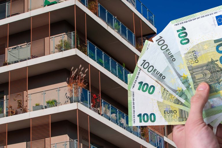 Euro,Banknotes,And,Apartment,Building,In,The,Background.,Concept,Showing