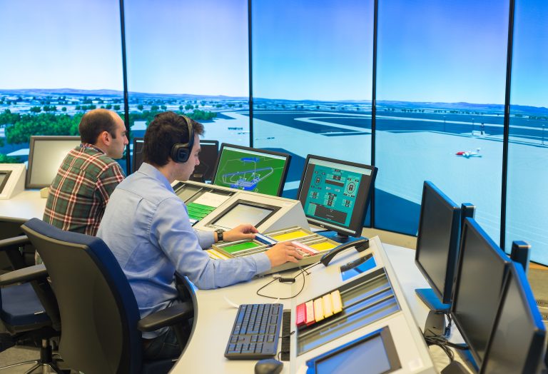 Air,Traffic,Controllers,In,Air,Traffic,Simulator,Center,With,Monitors