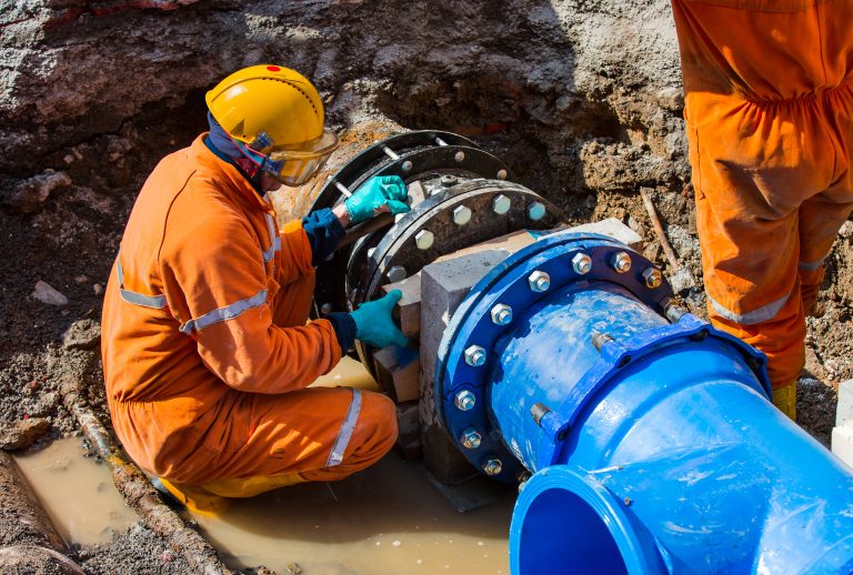 Old,Big,Drink,Water,Pipes,Joined,With,New,Blue,Valves