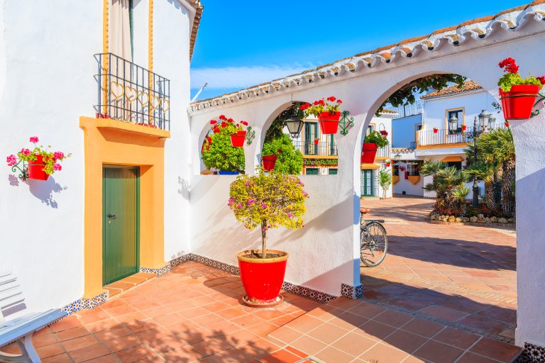 Typical,Houses,Decorated,With,Flowers,In,Small,Village,Near,Marbella.
