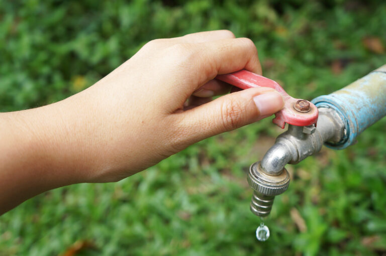 Hand,Shut,The,Faucet,,Water,Saving