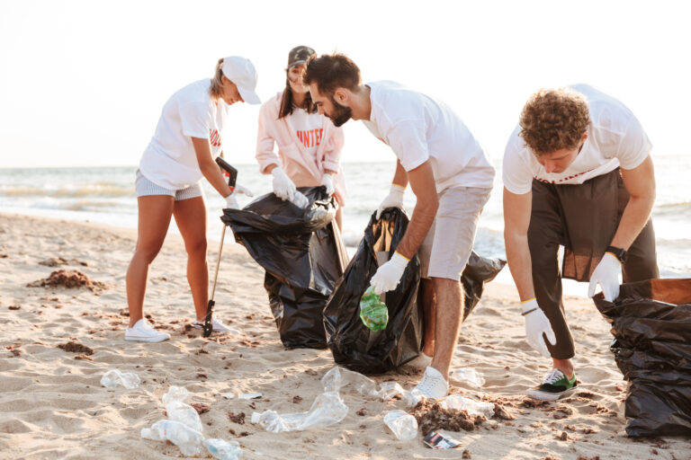 Photo,Of,Smart,Eco,Volunteers,People,Cleaning,Beach,From,Plastic