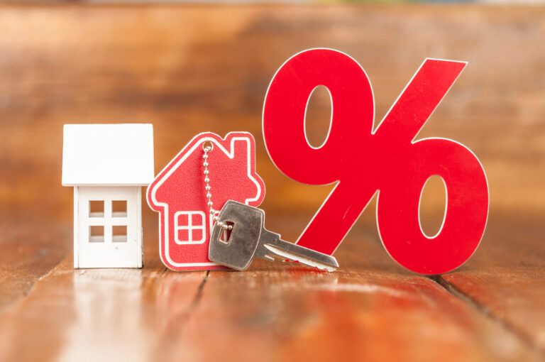 Wooden,Percent,Sign,And,Model,House,With,Key,On,Wooden