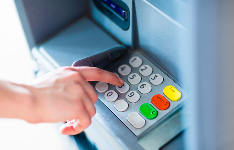 Close-up,Of,Hand,Entering,Pin/pass,Code,On,Atm/bank,Machine,Keypad