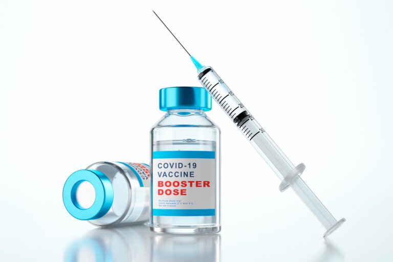 Booster,Vaccination,Concept,With,Syringe,And,Bottles,Of,Covid-19,Vial