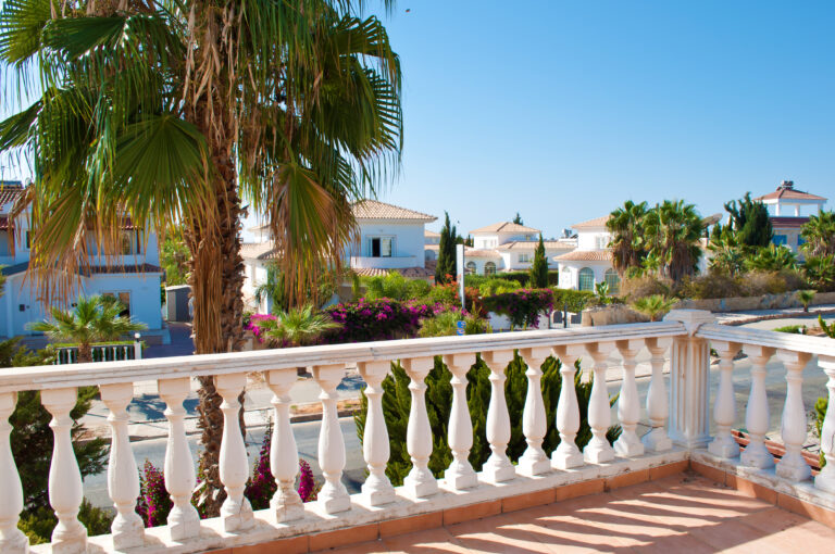 View,On,A,Street,With,Many,White,Villas,,One,High