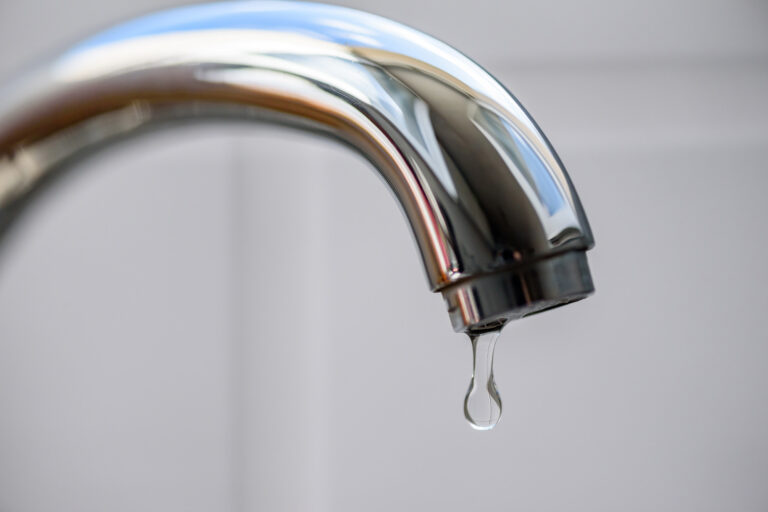 Clean,Water,Drop,Falling,From,A,Dripping,Kitchen,Faucet,,An