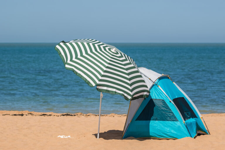 Beach,Umbrella,And,Sun,Shelter,Tent,On,The,Beach,Of