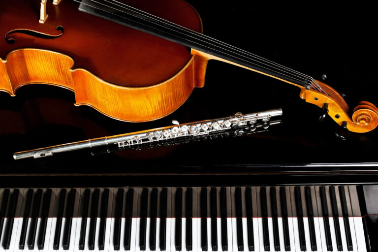 Musical,Instruments,Lying,On,The,Piano,In,Dark,Colors