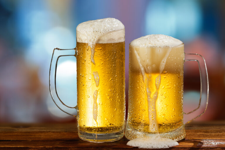 Cold,Light,Beer,Mug,In,A,Pub