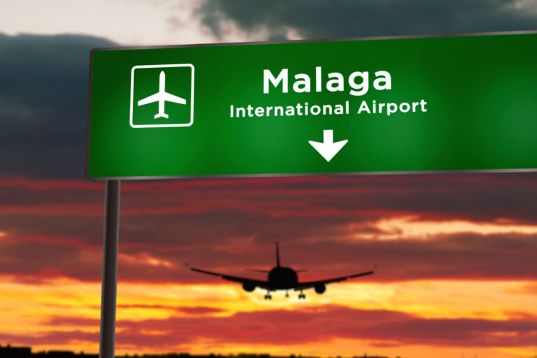 Airplane,Silhouette,Landing,In,Malaga,,Spain.,City,Arrival,With,Airport