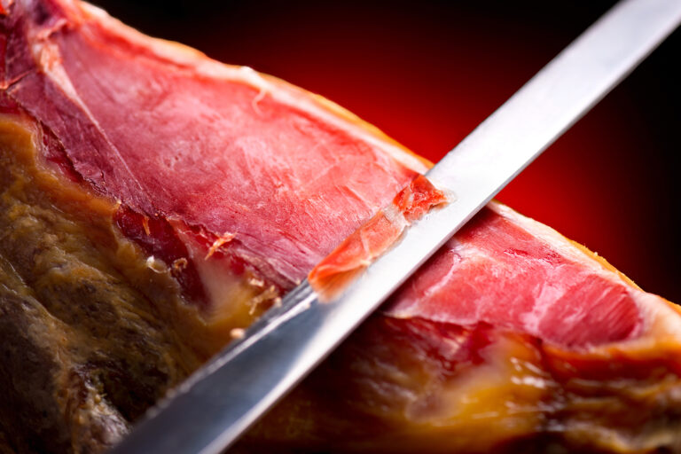 Jamon.,Jamon,Serrano.,Traditional,Spanish,Ham,On,Black,Close,Up.
