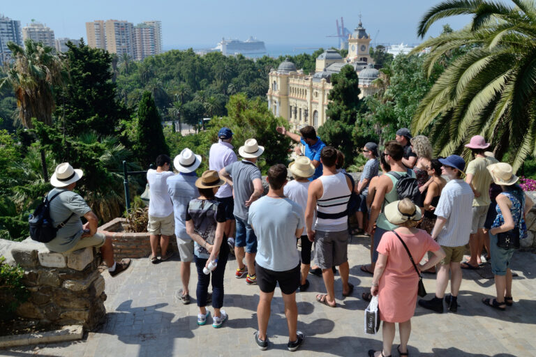 July,8,,2015,,Malaga,,Spain.,A,Tour,Group,Listens,To