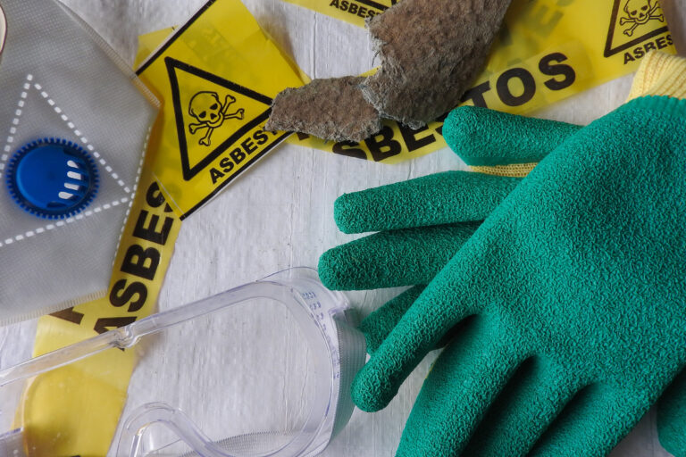 Close,Up,Old,Pieces,Asbestos,,Roof,Tiles,And,Protective,Equipment.