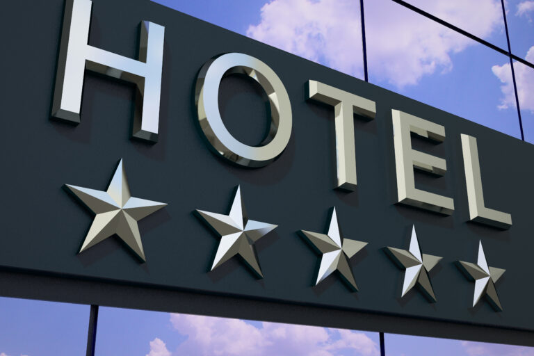 The,Hotel,With,A,Five,Stars,Sign,On,The,Modern