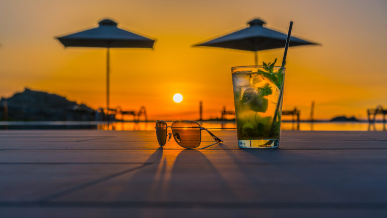 Cocktail,With,Sunglasses,Near,The,Swimming,Pool