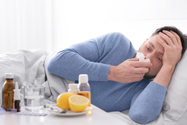 Young,Ill,Man,Lying,In,Bed,At,Home