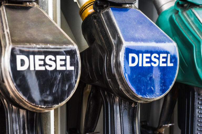 Diesel,Fuel,Pistols,On,A,Gas,Station,Refueling,Stand.,Detailed