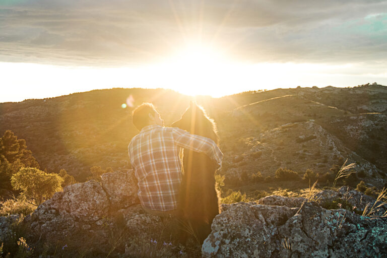 Man,At,Sunset,Hugging,His,Dog.,Concept,Of,Love,Between