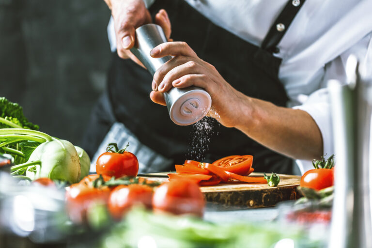 Chef,Cook,Preparing,Vegetables,In,His,Kitchen.