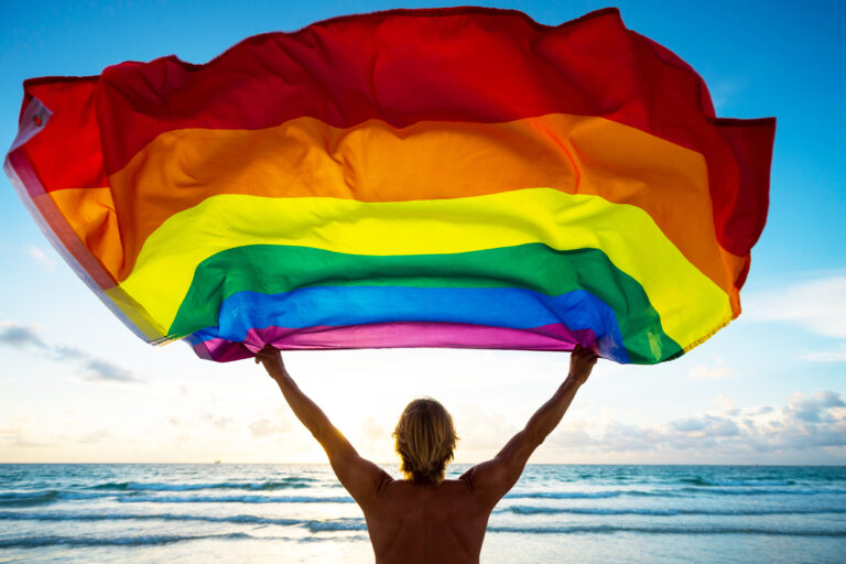 Colorful,Silhouette,Of,A,Man,With,Blond,Hair,Holding,A