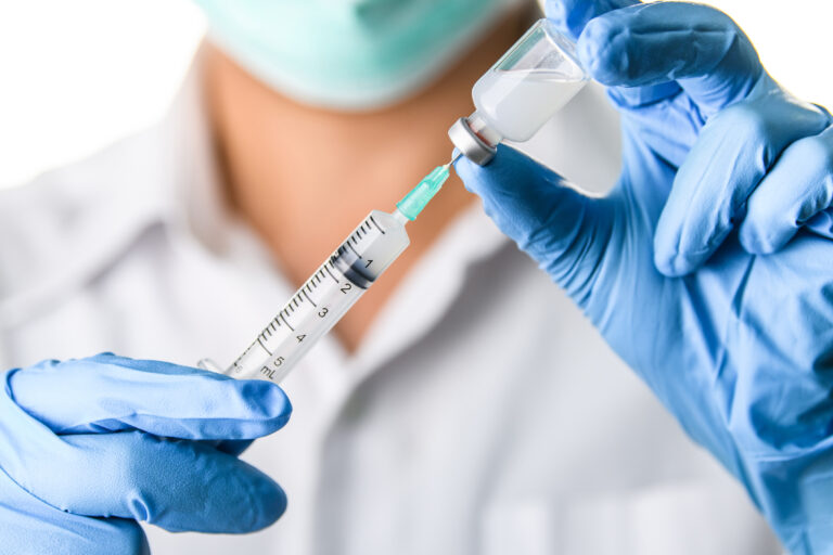 Doctor,,Nurse,,Scientist,Hand,In,Blue,Gloves,Holding,Flu,,Measles,