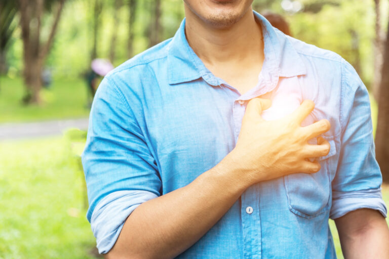 Elderly,Man,Holding,Hands,On,Chest,Suffering,From,Heart,Attack,
