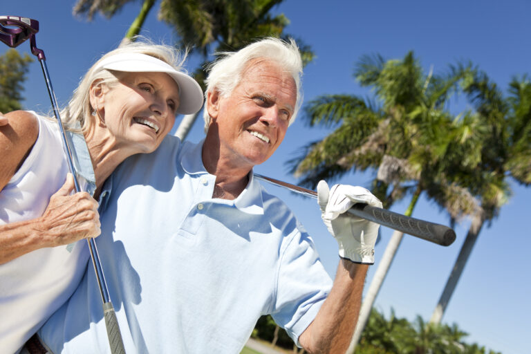 Happy,Senior,Man,And,Woman,Couple,Together,Playing,Golf,Putting