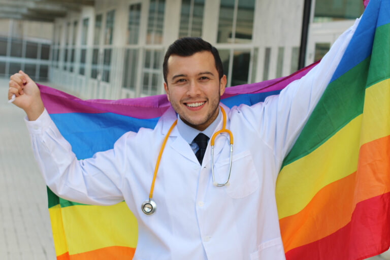Supporting,Doctor,Holding,Rainbow,Flag
