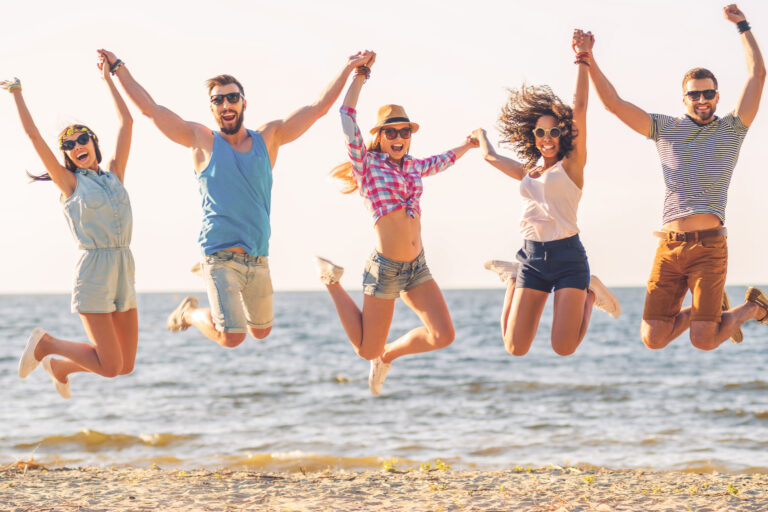 Summer,Fun.,Group,Of,Happy,Young,People,Holding,Hands,And