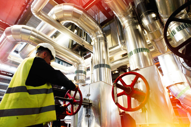 Modern,Factory,Worker,Turning,Valve