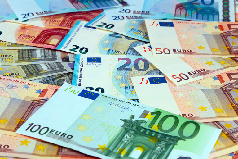 Pile,Of,Paper,Euro,Banknotes,As,Part,Of,The,United