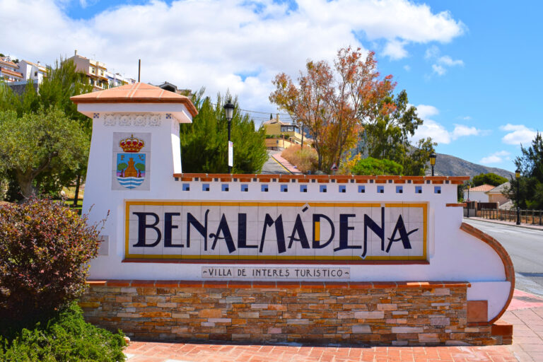 Entrance,Sign,Of,Benalmadena,Pueblo,,"villa,De,Interes,Turistico",Means