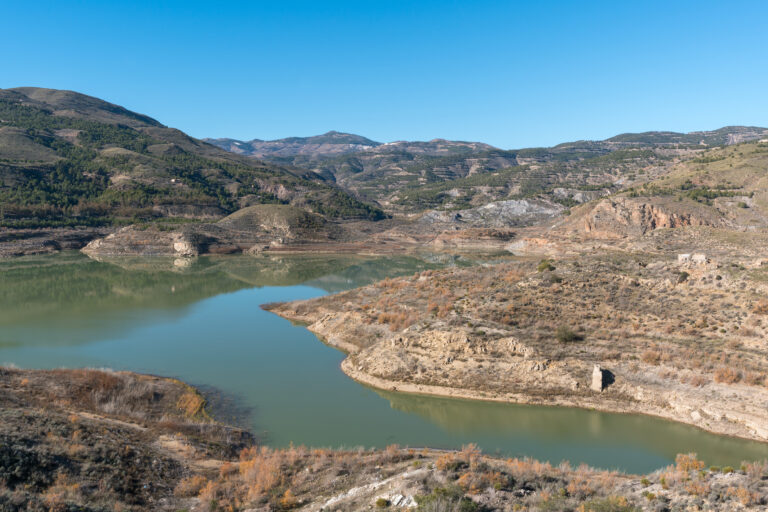 Beninar,Reservoir,In,Southern,Spain,,There,Are,Mountains,And,Trees,