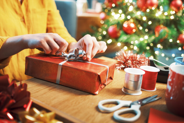 Woman,Preparing,Christmas,Gifts,At,Home,,Celebrations,And,Holidays,Concept