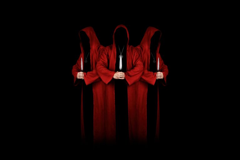 Mystery,People,In,A,Red,Hooded,Cloaks,In,The,Dark
