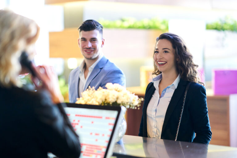 Couple,Booking,A,Hotel,Room,,Concept