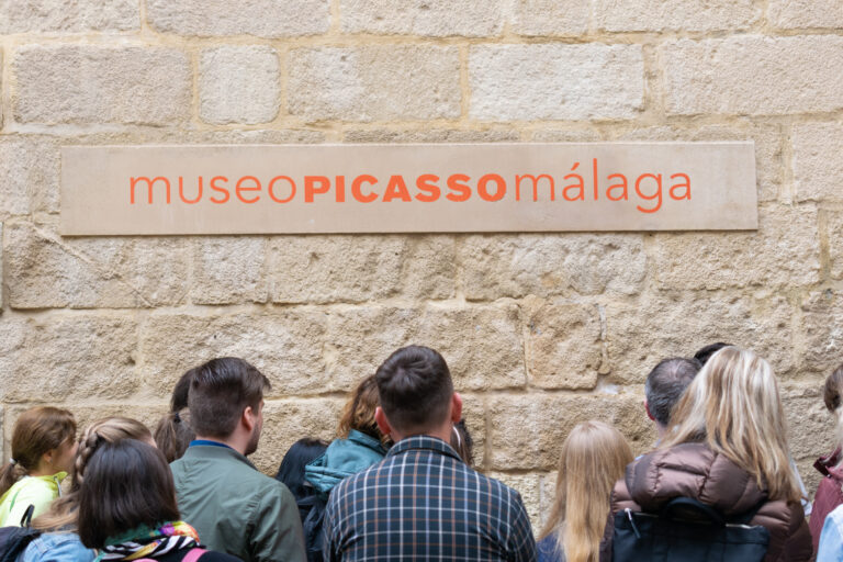 Malaga/spain,-,02-18-2020,:,Group,Of,Tourists,In,Front,Of