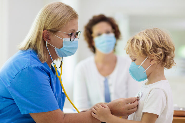 Pediatrician,Doctor,Examining,Sick,Child,In,Face,Mask.,Ill,Boy